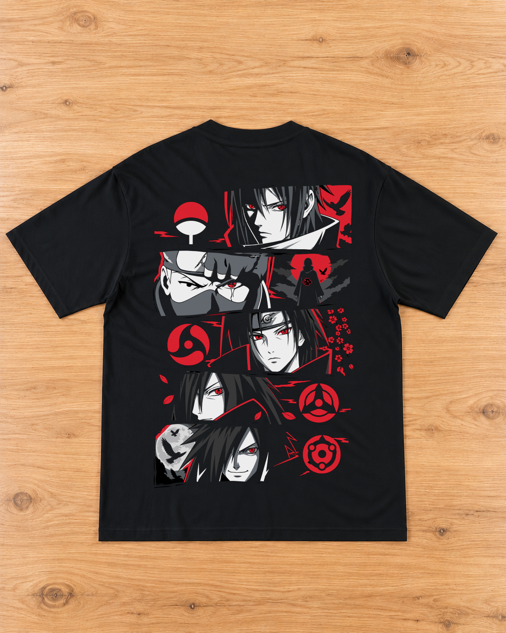 Back of a black oversized T-shirt featuring a red, white and grey anime-style portrait collage with eye motifs and crow silhouettes.